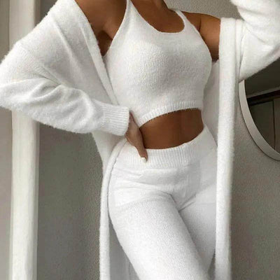 Shaan Dynasty 3-piece fuzzy fleece loungewear set with cozy cardigan, cropped tank, and high-waisted shorts in soft white fabric